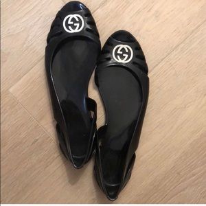 Gucci jelly flats in black, white GC logo. Size 6